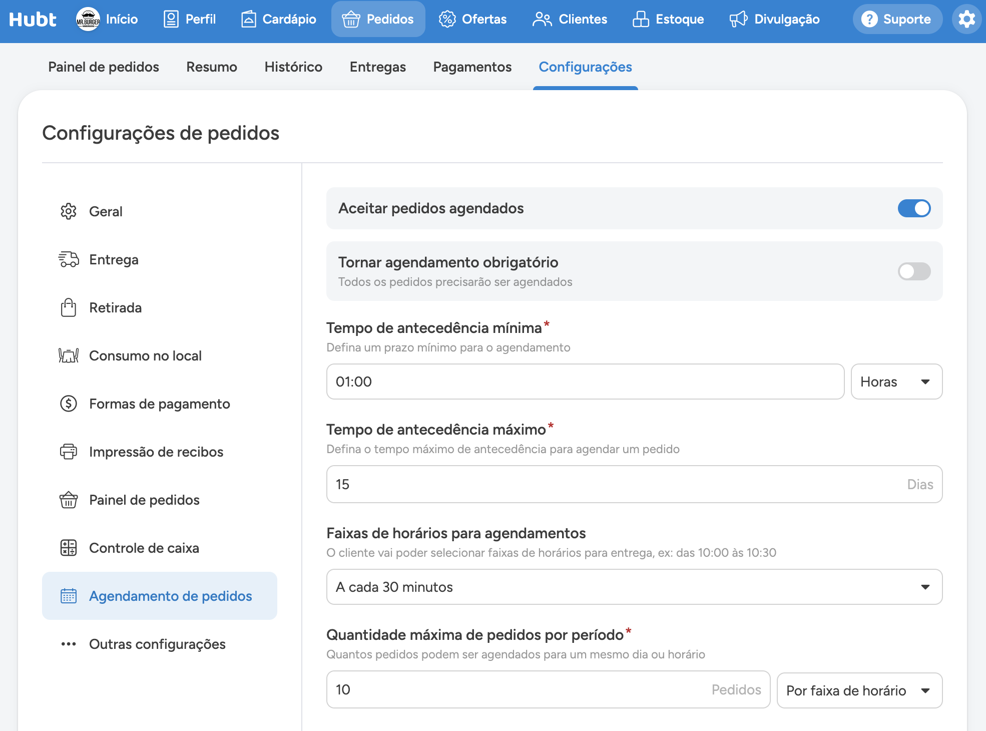 Seção Agendamento de pedidos nas configurações, com a chave de aceitar agendados, os tempos de antecedência e as faixas de horários