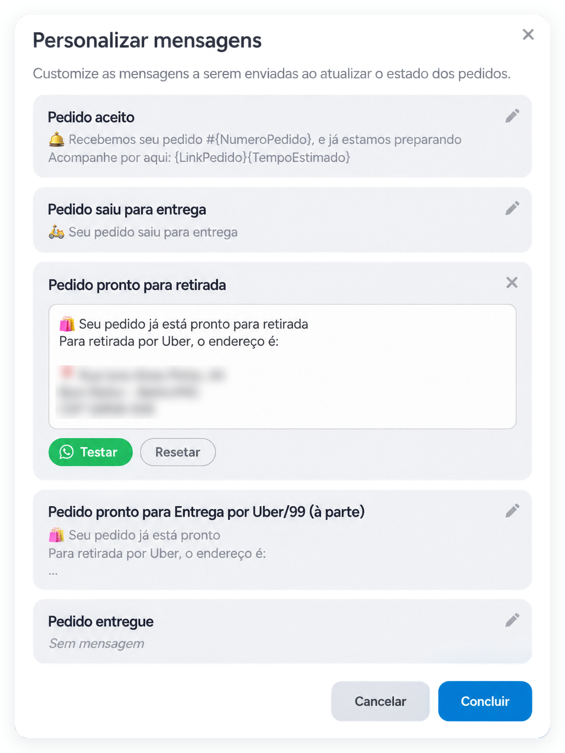 Mensagem Pedido pronto para retirada aberta para edição, com o endereço do estabelecimento e os botões Testar e Resetar